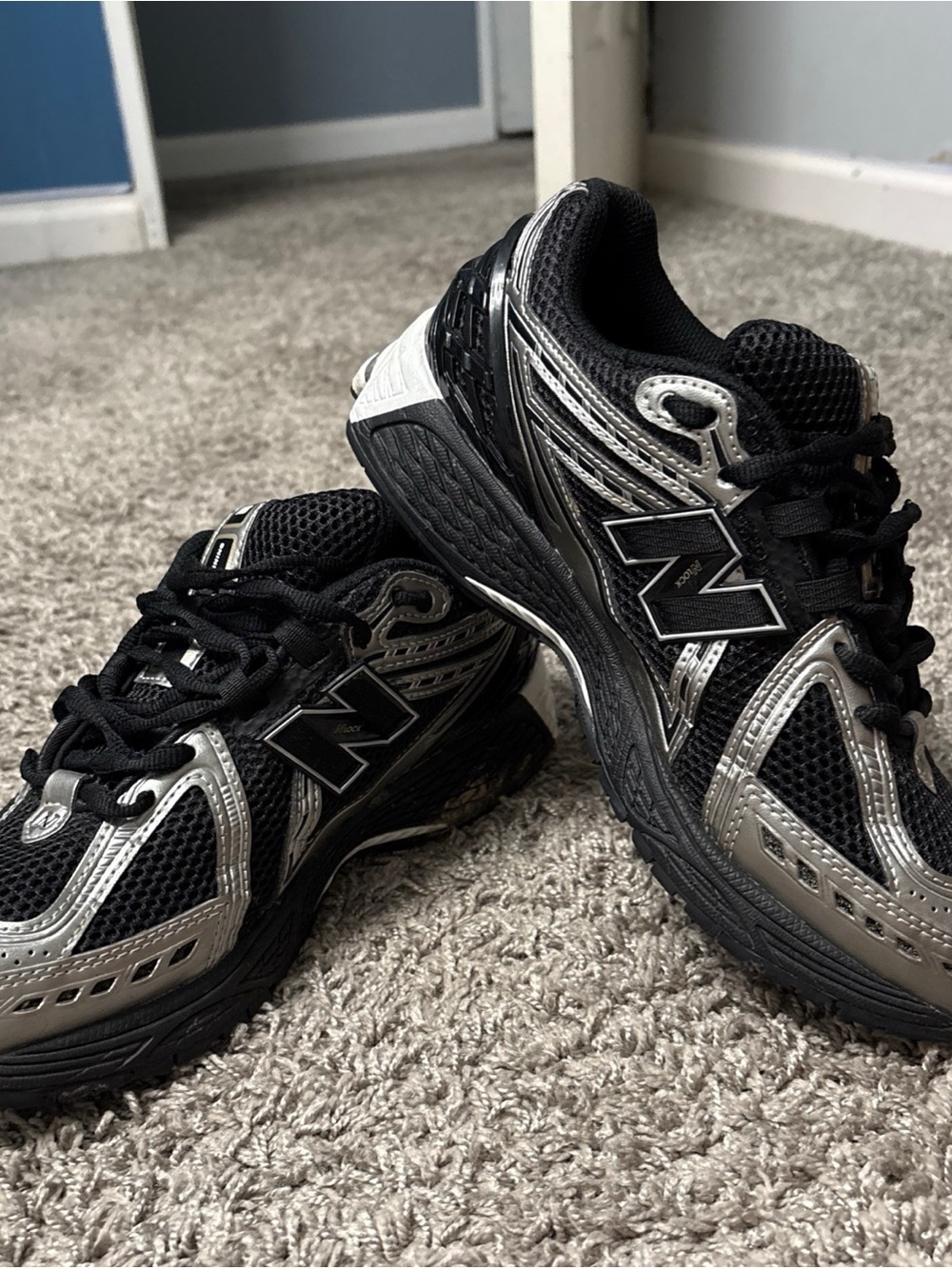 New Balance Black and Silver Athletic Sneakers
